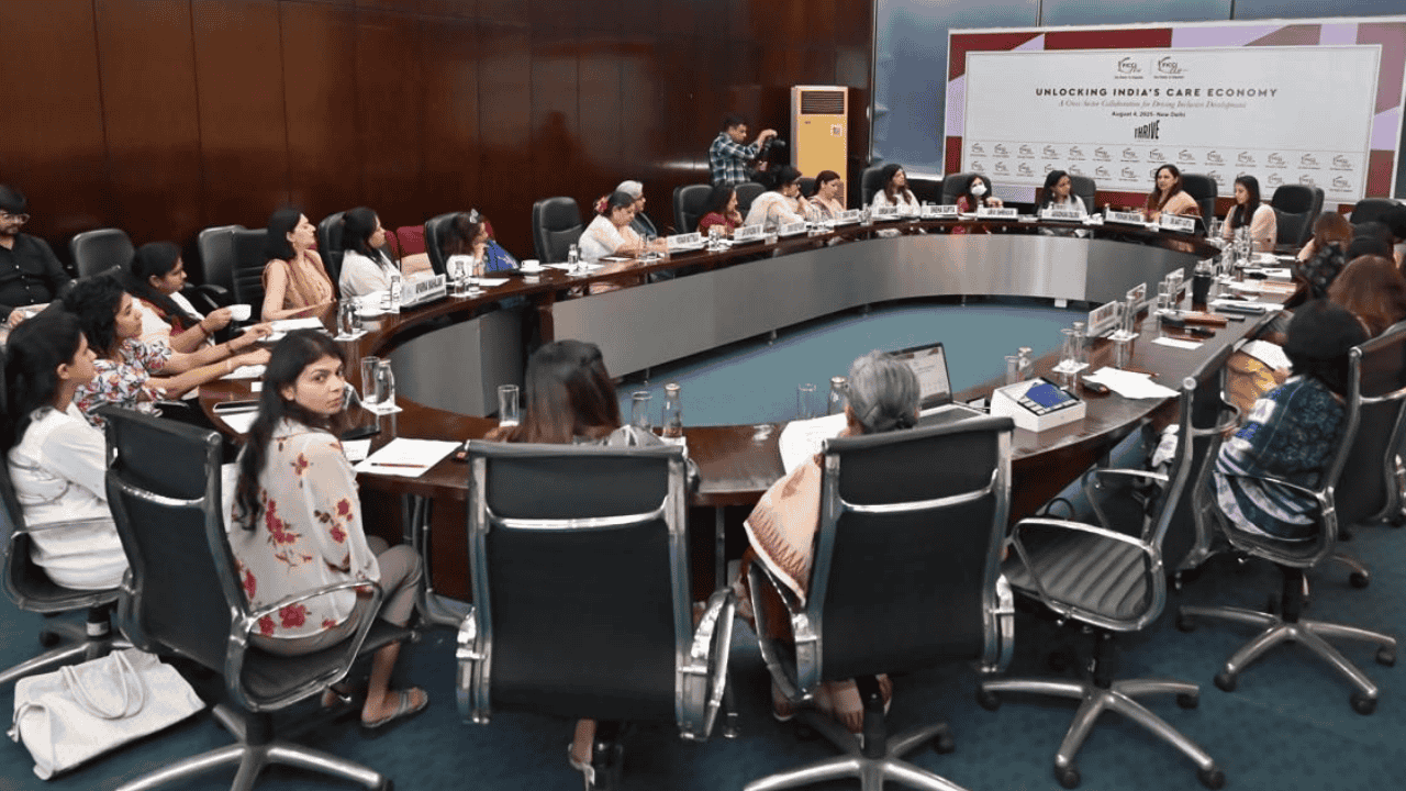 Large group of women sitting around a conference table