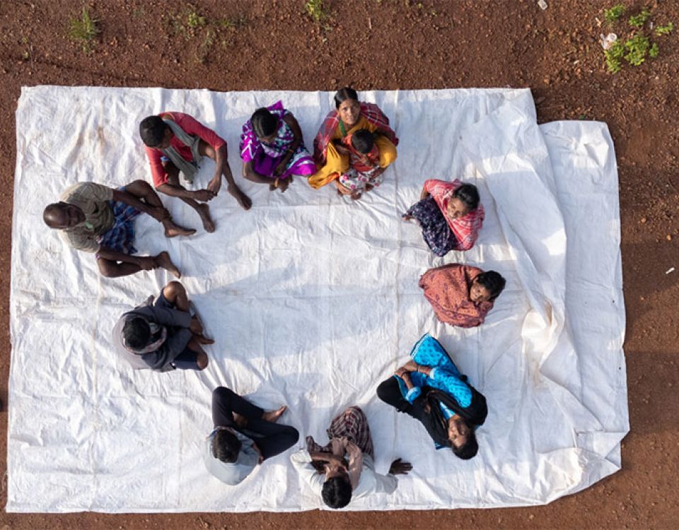 carers sit in circle