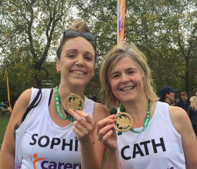 Sophie and Cath with medals after Royal Parks Half Marathon