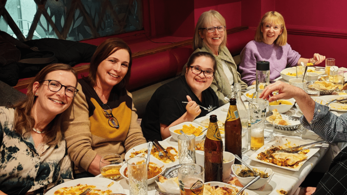 Women enjoying their meal at dinner