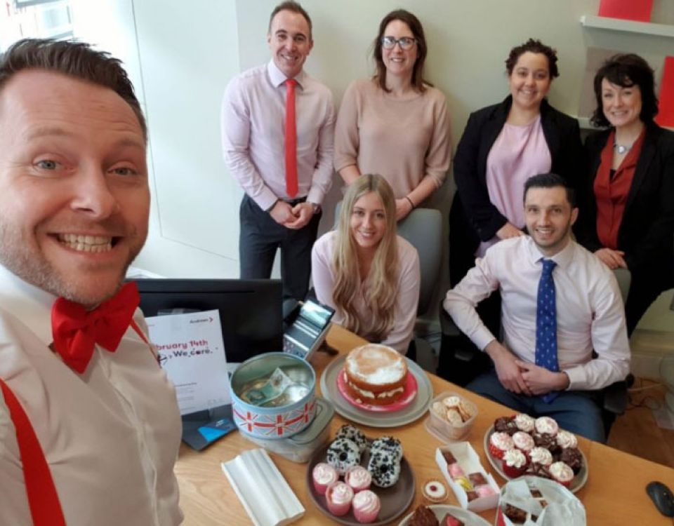 Corporate Partners smile at camera
